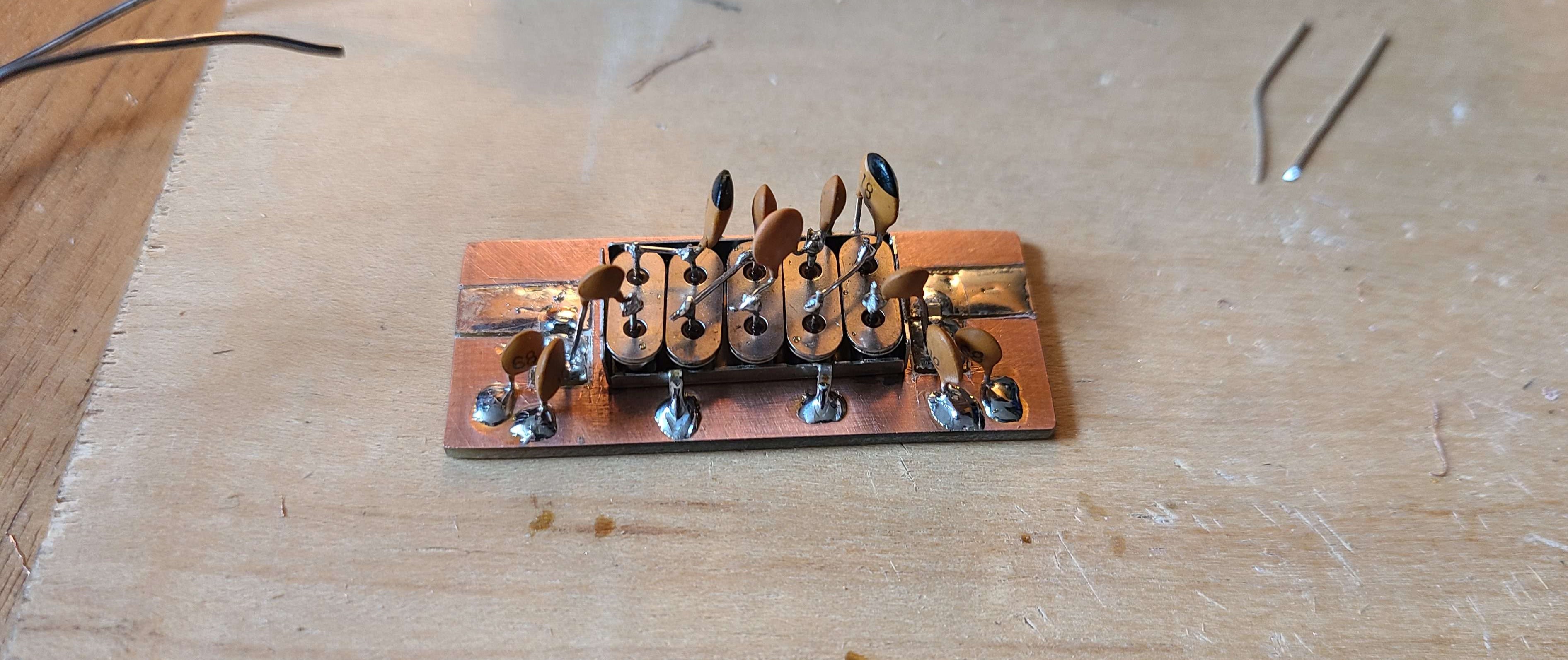 Crystal filter in a shield on board with matching circuitry