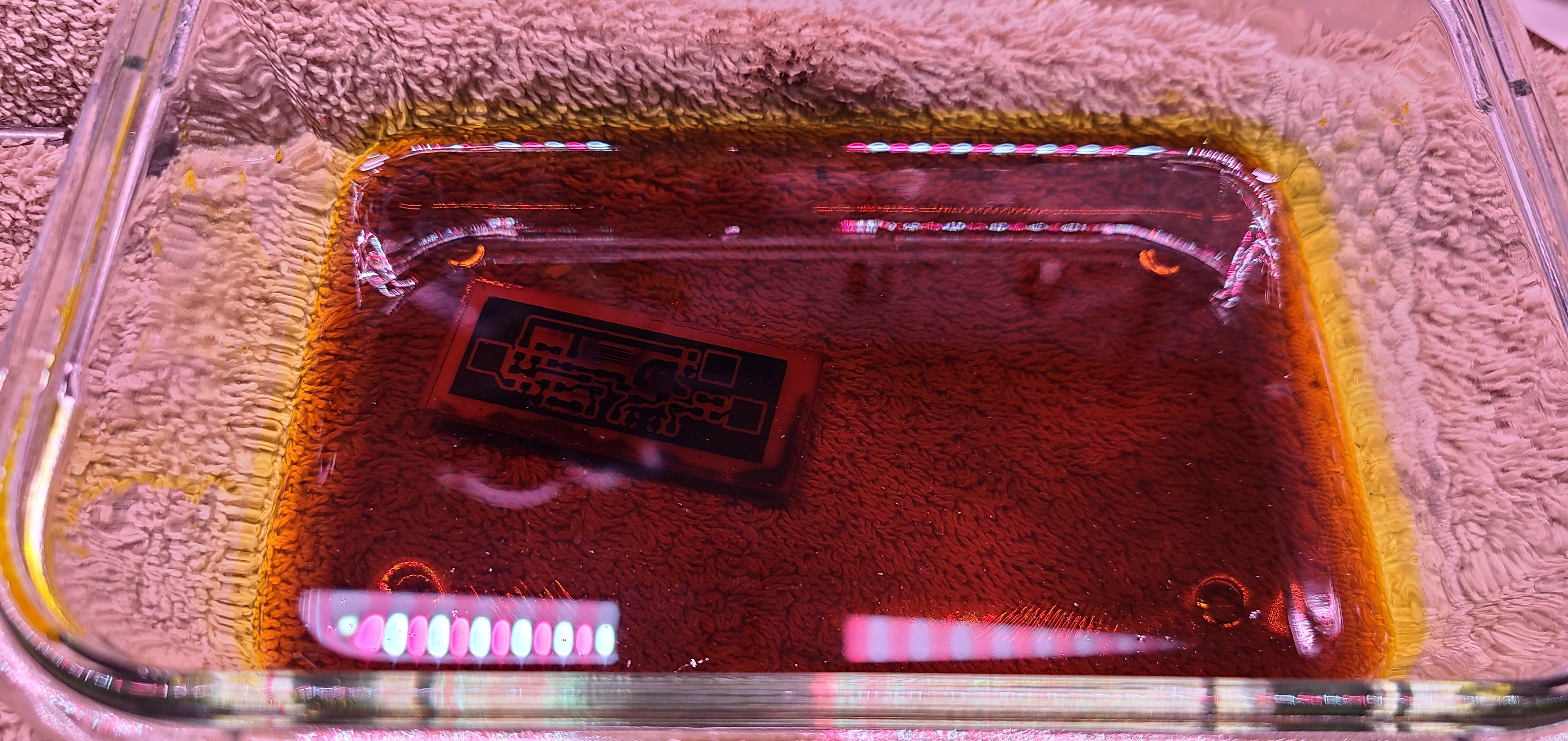 Board in etching solution
